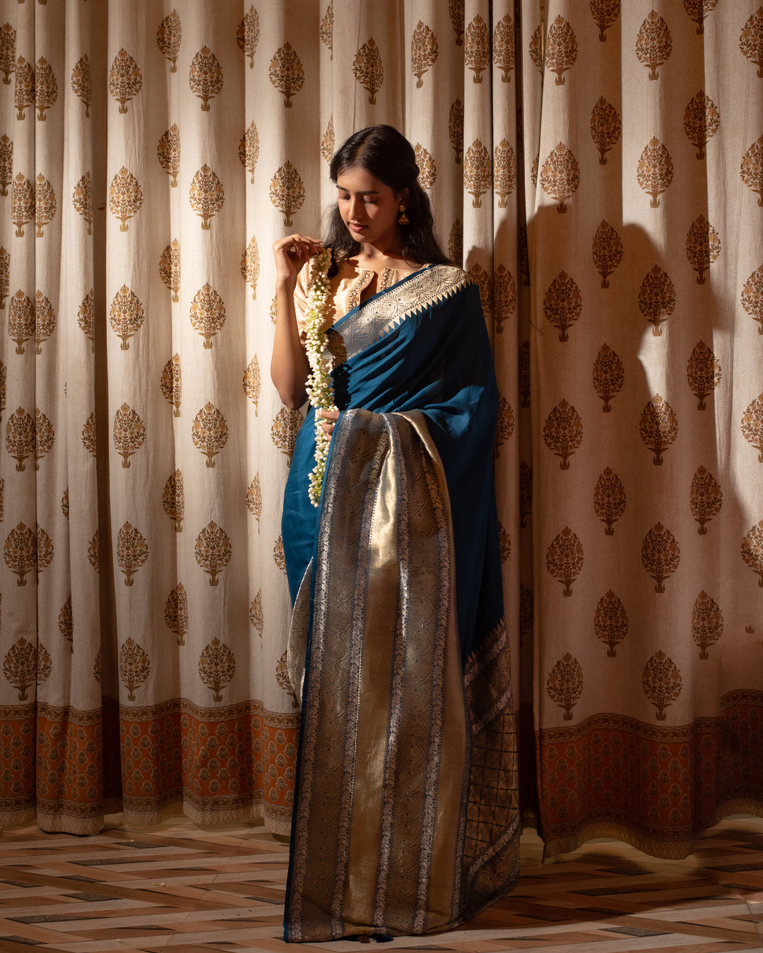 Neelam- Teal Blue Georgette Silk Banarasi Saree