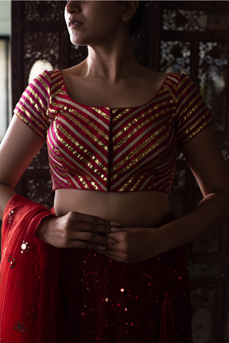 Aheli- Red Sequinned Hand-Embroidered Lehenga